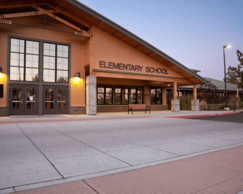 Elementary school building with classrooms and educational facilities, illustrating specialized property valuation, replacement cost, and eminent domain considerations for school properties.